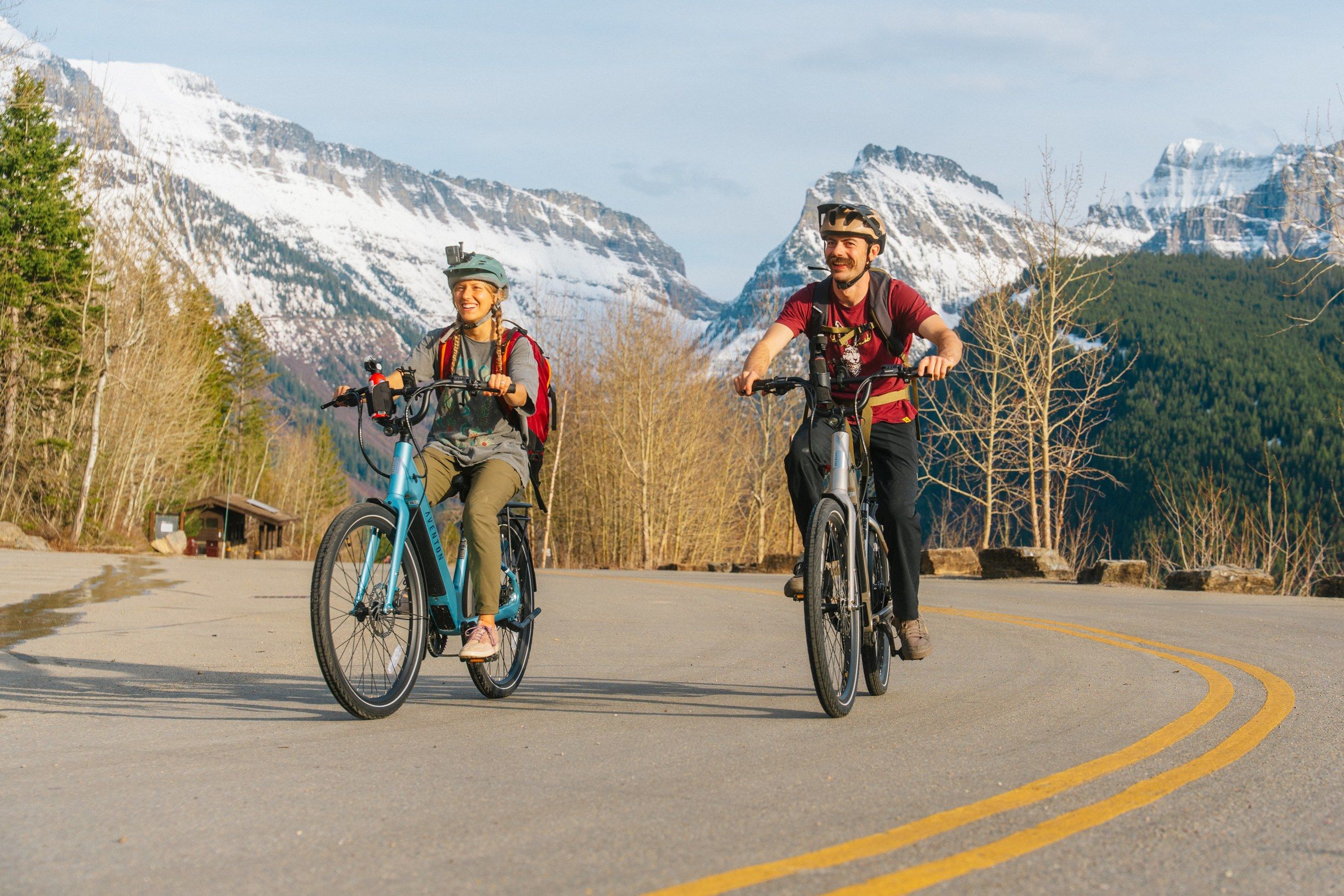 The Montana E-Bikes team handing over a rental e-bike outside the shop